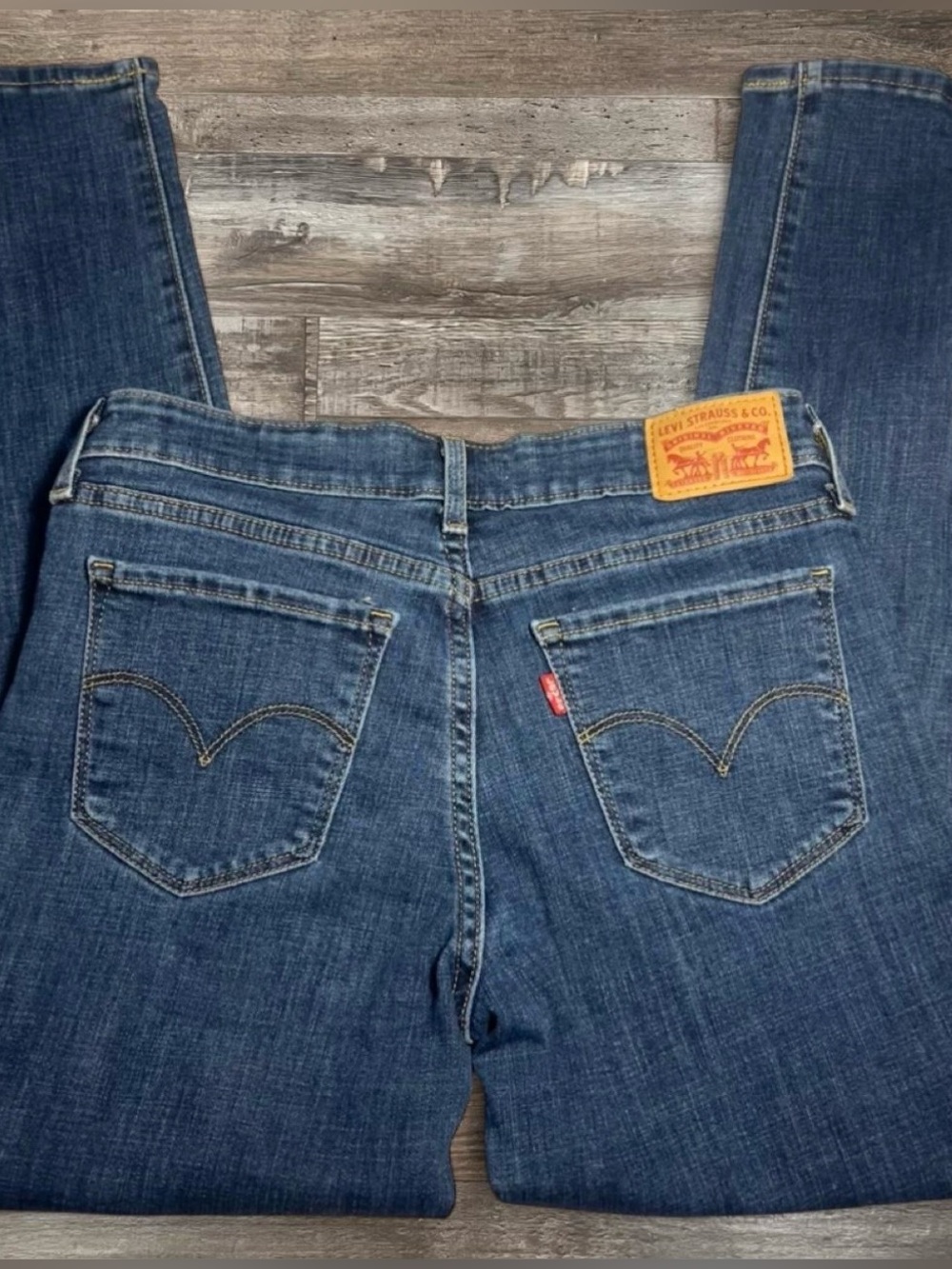 Levi’s 711 Distressed Mid Rise Skinny Jeans